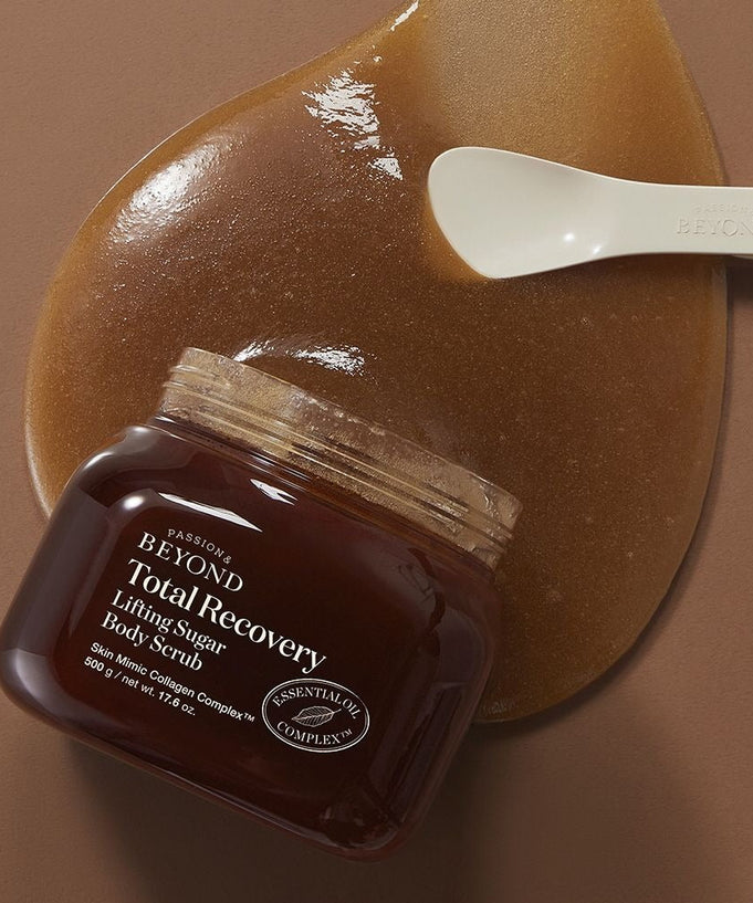 PASSION&BEYOND Total Recovery Lifting Body Scrub 500g with spoon on brown background