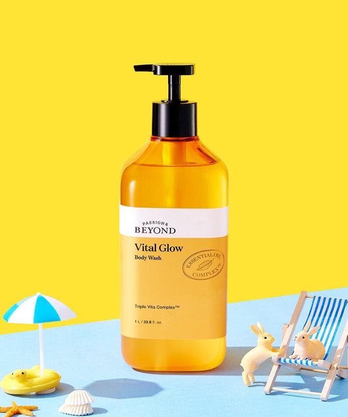PASSON&BEYOND Vital Glow Body Wash 1L bottle with beach-themed decor on a vibrant yellow background.