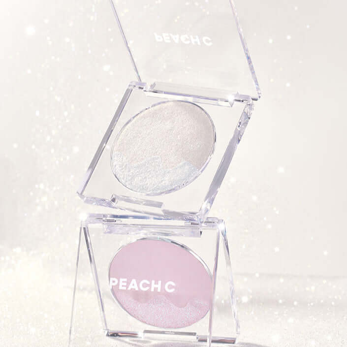 PEACH C Dual Beam Highlighter showcasing its shimmering glow and smooth application.