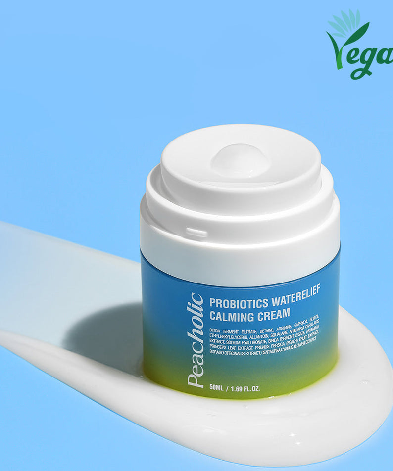 Image of PEACHOLIC Probiotics Water Relief Calming Cream 50ml with vegan label on a blue background.