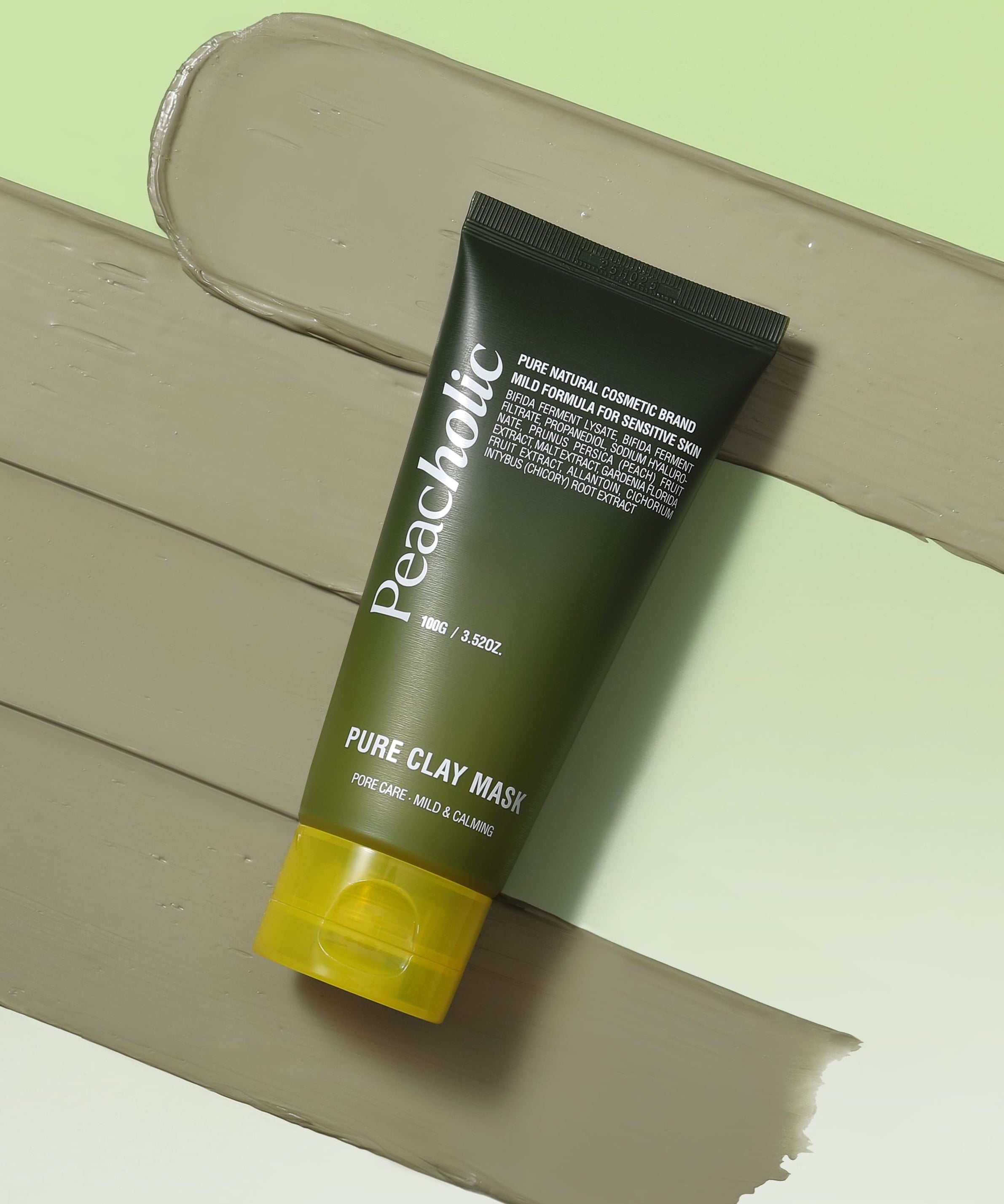 PEACHOLIC Pure Clay Mask 100ml displayed on clay background