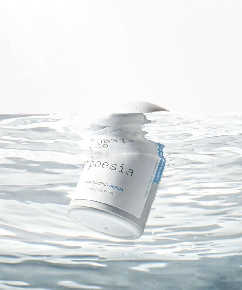POESÃA Hydro Hyaluronic Deep Moisturizing Ampoule Serum 48ml floating in water