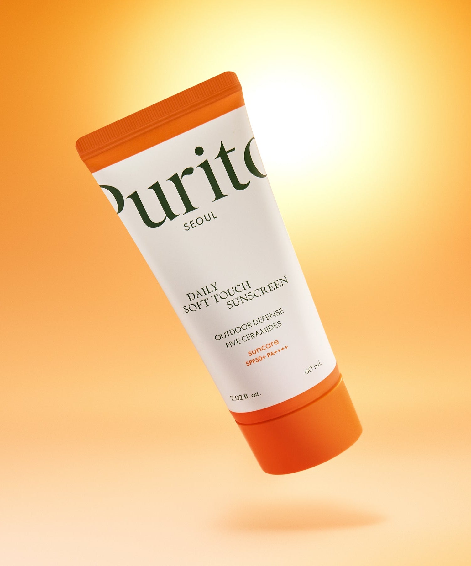 Image of PURITO Daily Soft Touch Sun Cream SPF50+PA++++ against a sunlit background