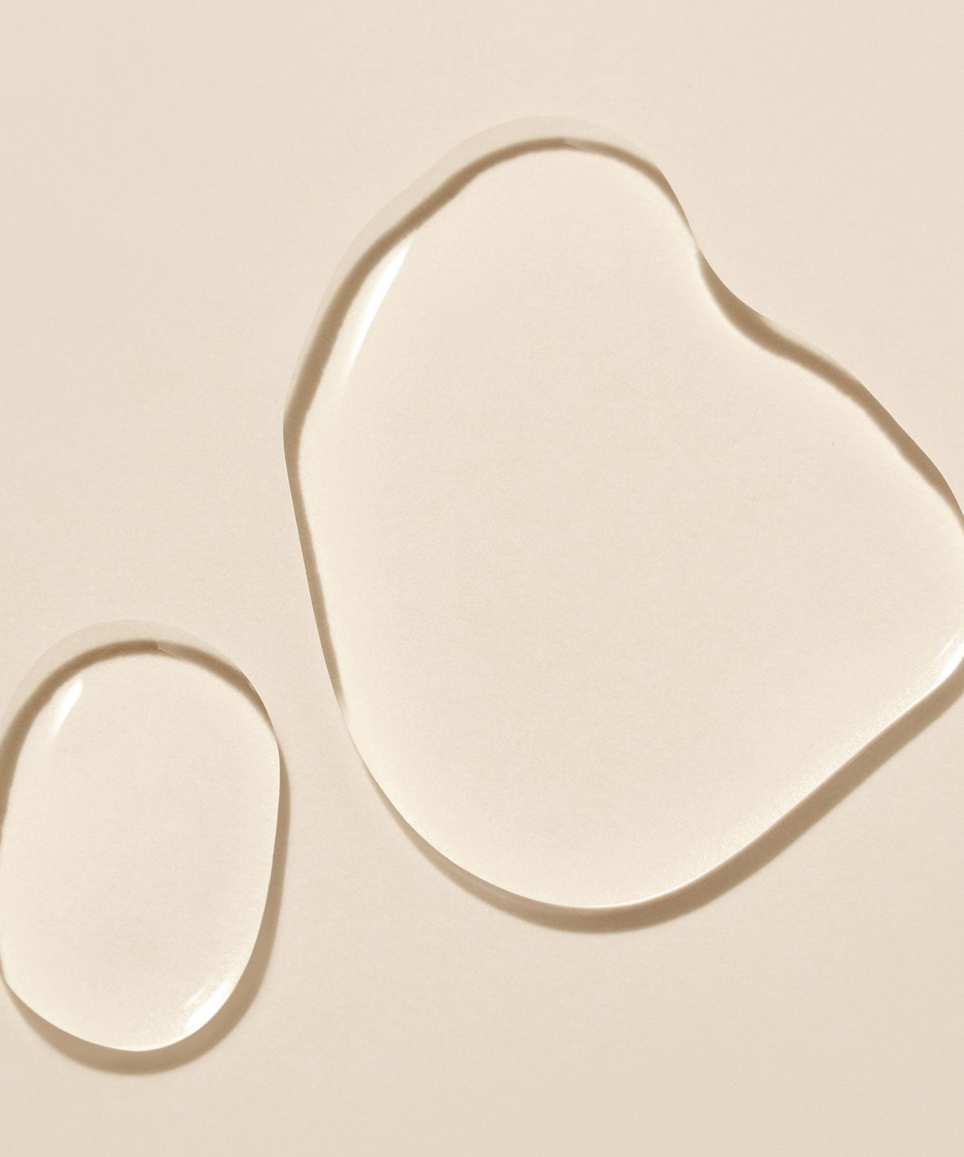 Texture of PURITO Fermentedd Complex 94 Boosting Essence 150ml displayed on a beige background