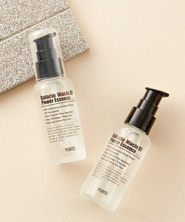 PURITO Galacto Niacin 97 Power Essence 60ml bottles on a neutral background for skincare promotion