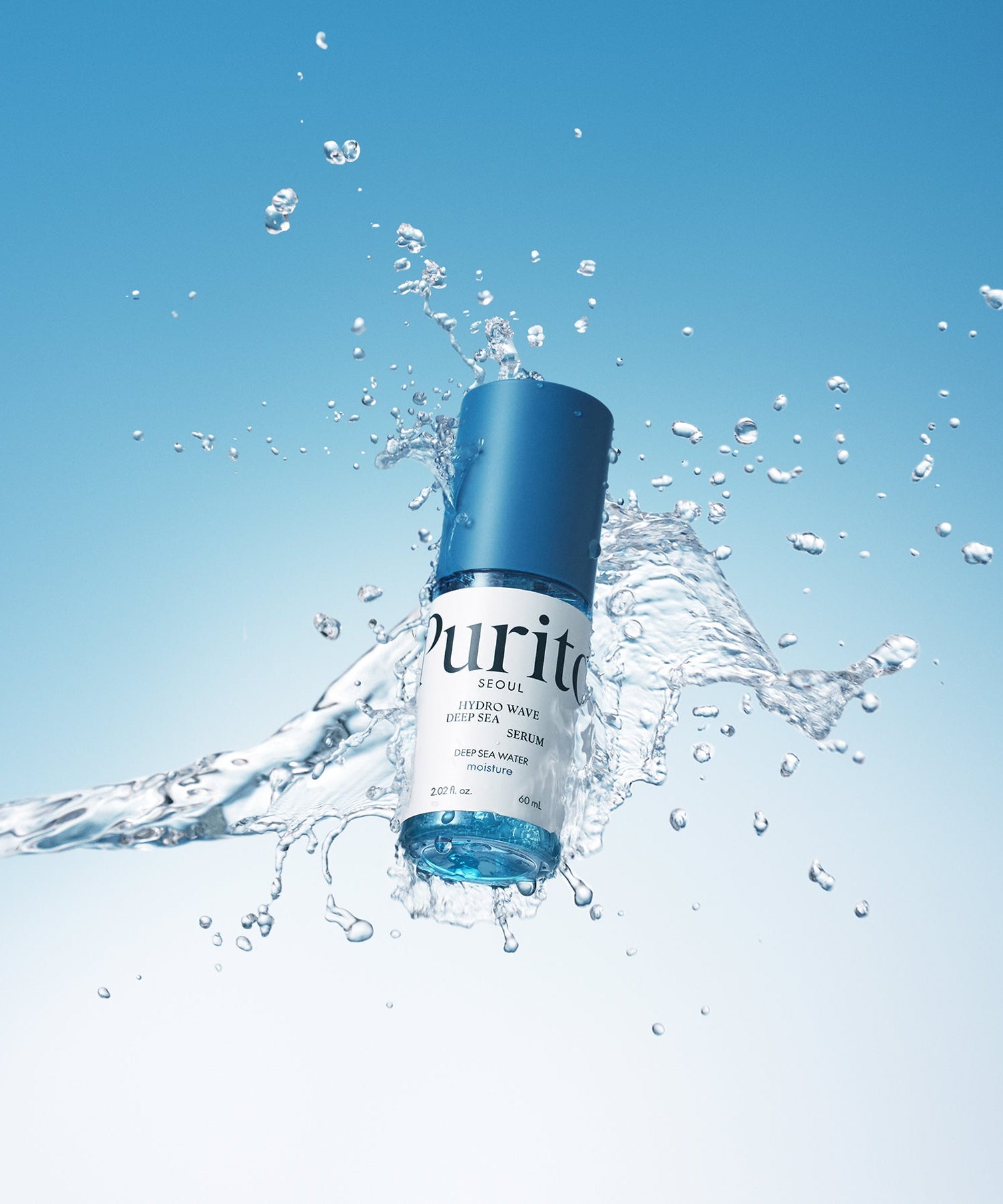 PURITO Hydro Wave Deep Sea Serum 60ml amidst splashing water with blue background