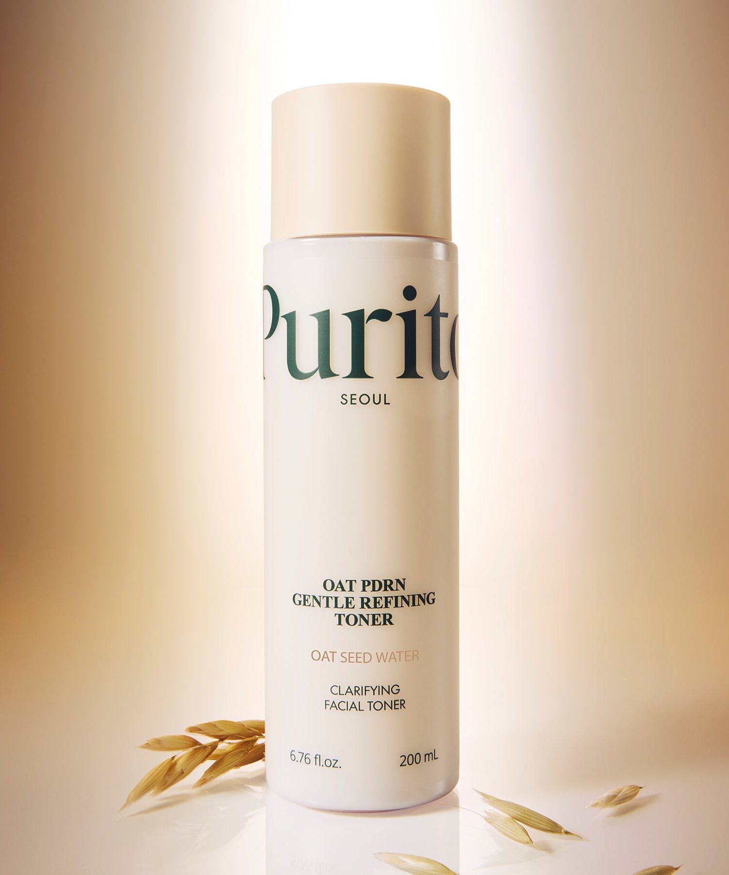 PURITO Oat PDRN Gentle Refining Toner 200ml bottle with oat grains on a light background