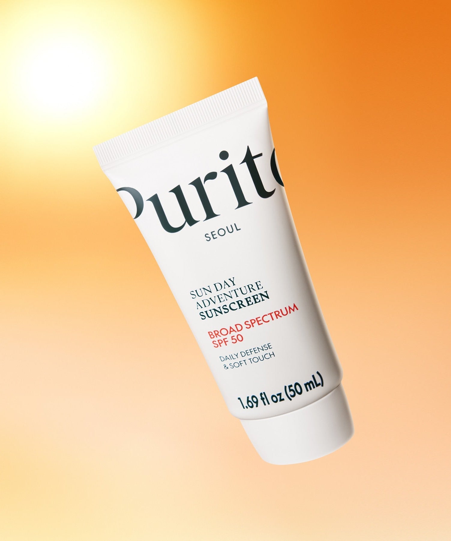 PURITO Sunday Adventure Sunscreen SPF50 50ml against sunset background