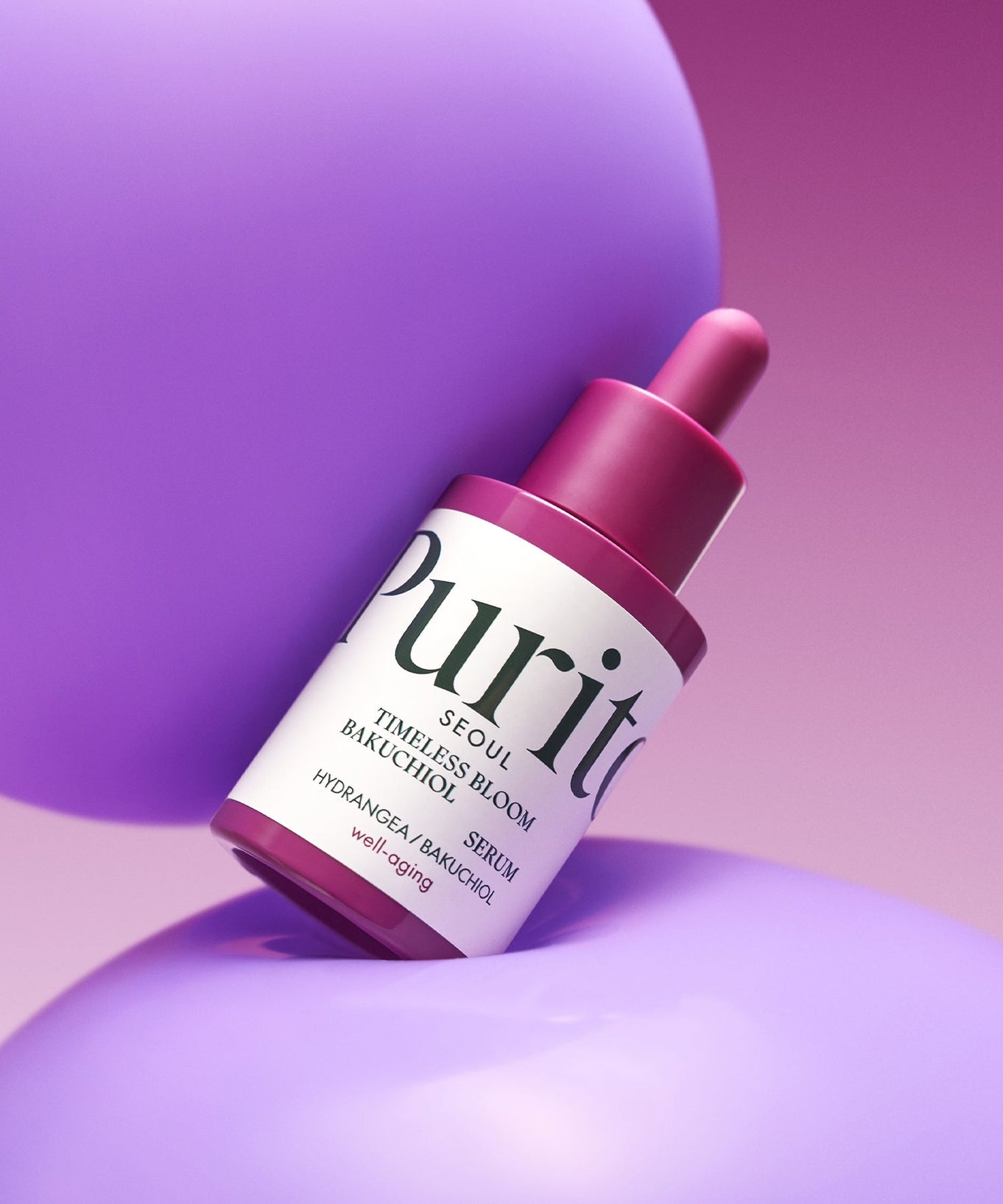PURITO Timeless Bloom Bakuchiol Serum 30ml on purple background, focus on skincare packaging design.