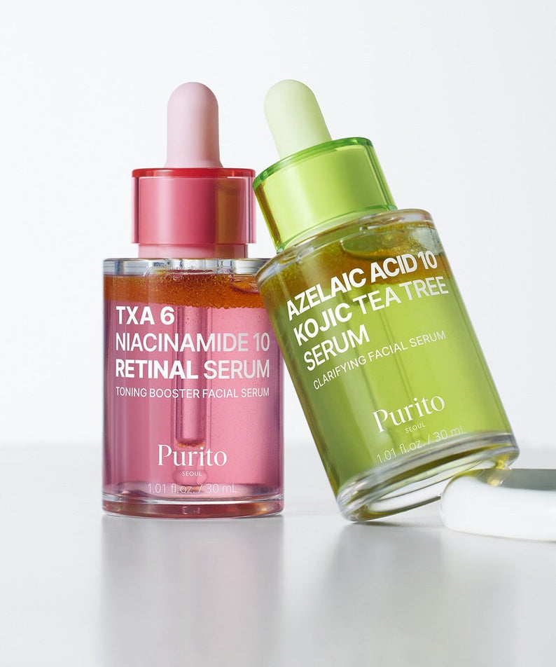 PURITO Tranexamic Acid 6 Niacinamide 10 Retinal Serum 30ml and Azelaic Acid Kojic Tea Tree Serum bottles on display