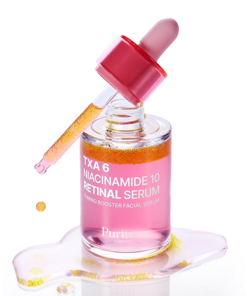 Bottle of PURITO Tranexamic Acid 6 Niacinamide 10 Retinal Serum 30ml with dropper and pink serum spill on white background.