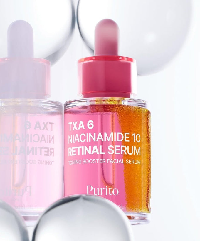 PURITO Tranexamic Acid 6 Niacinamide 10 Retinal Serum 30ml bottle with pink dropper against reflective backdrop.