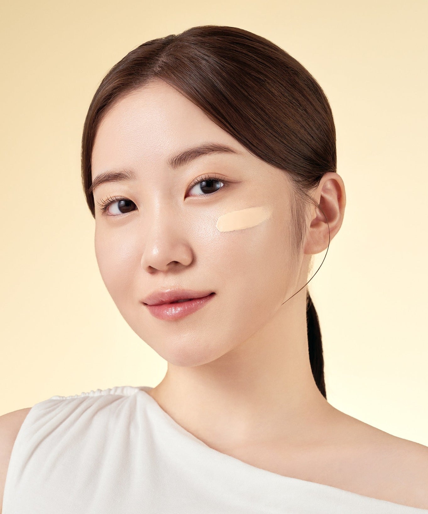 Woman applying PURITO Wonder Releaf Centella BB Cream 30mml on face for smooth complexion
