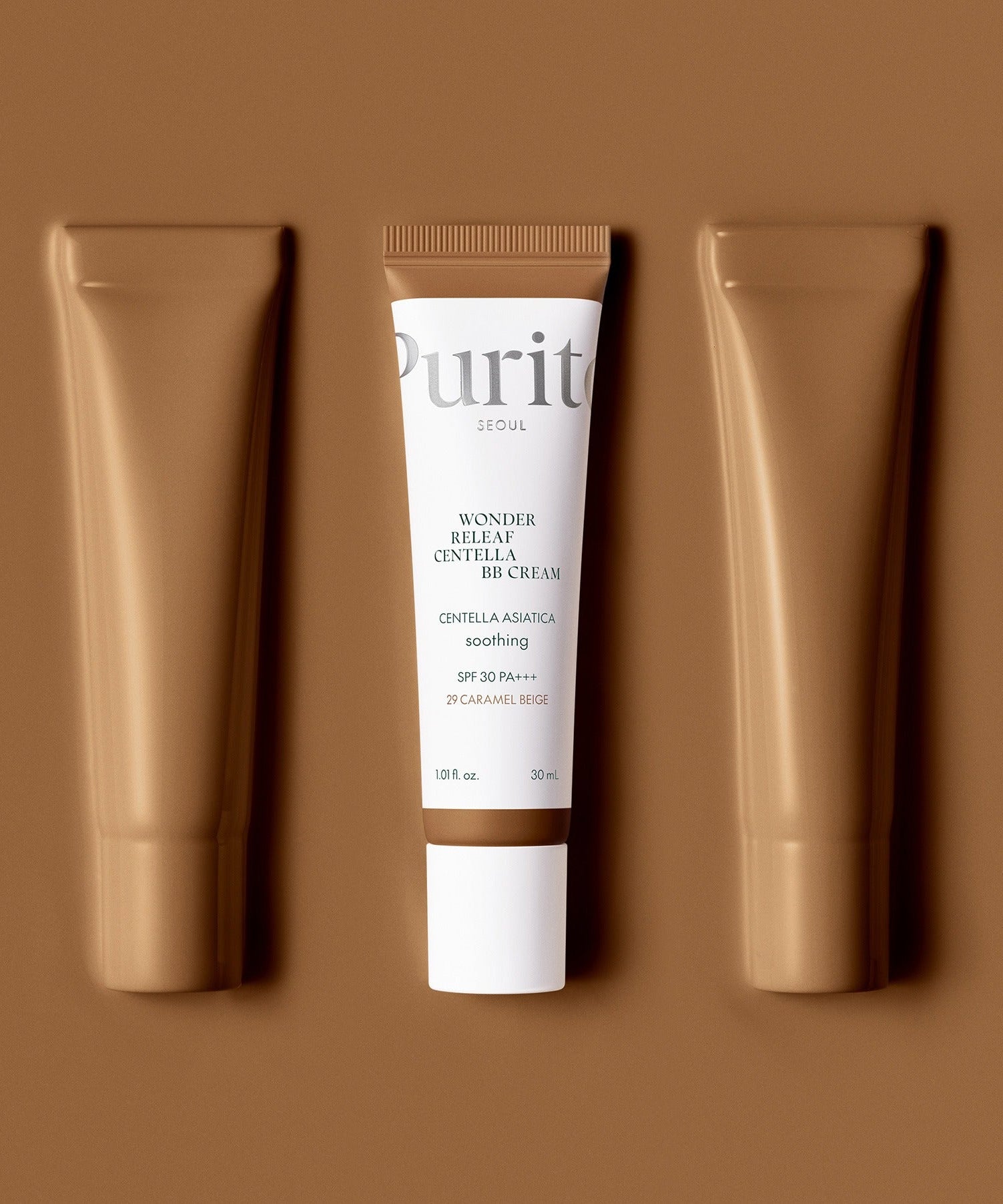 PURITO Wonder Releaf Centella BB Cream 30mml tube on a brown background