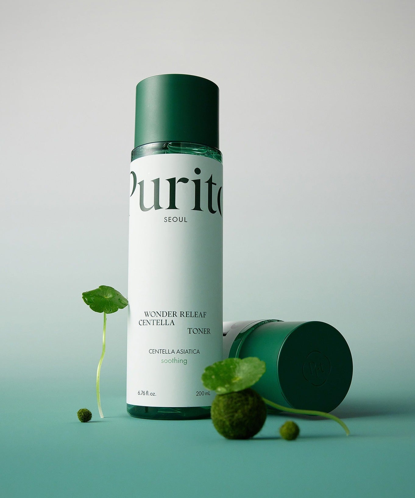 PURITO Wonder Relief Centella Toner 200ml bottle with plant elements on a green background