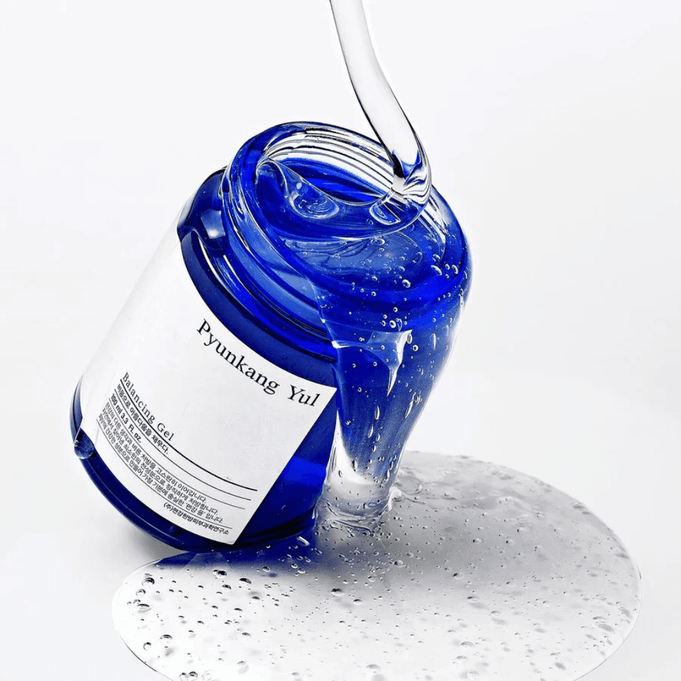 PYUNKANG YUL Balancing Gel 100ml pouring from blue jar showcasing texture and consistency