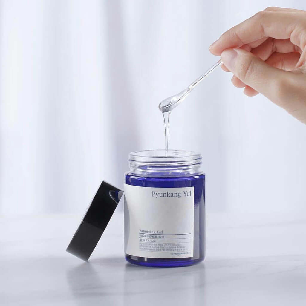 PYUNKANG YUL Balancing Gel 100ml being dispensed from a jar with a spoon