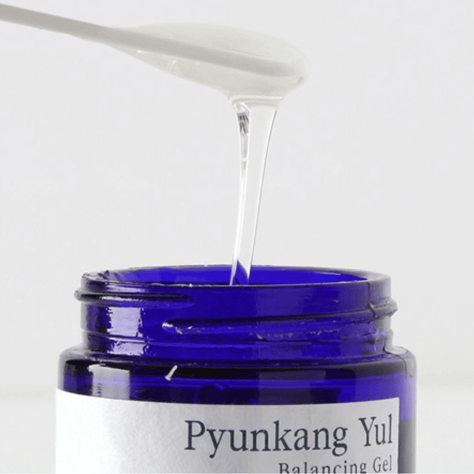 PYUNKANG YUL Balancing Gel 100ml in blue jar with gel being poured from a spoon.