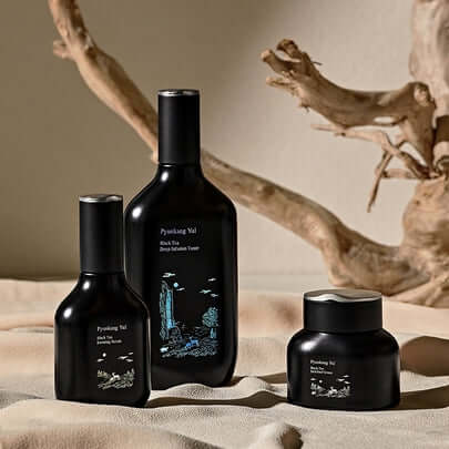 PYUNKANG YUL Black Tea Bojigi Gift Set featuring skincare bottles on an elegant background, perfect for luxurious beauty care.