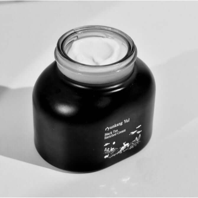 Image of PYUNKANG YUL Black Tea Enriched Cream 60ml jar with open lid