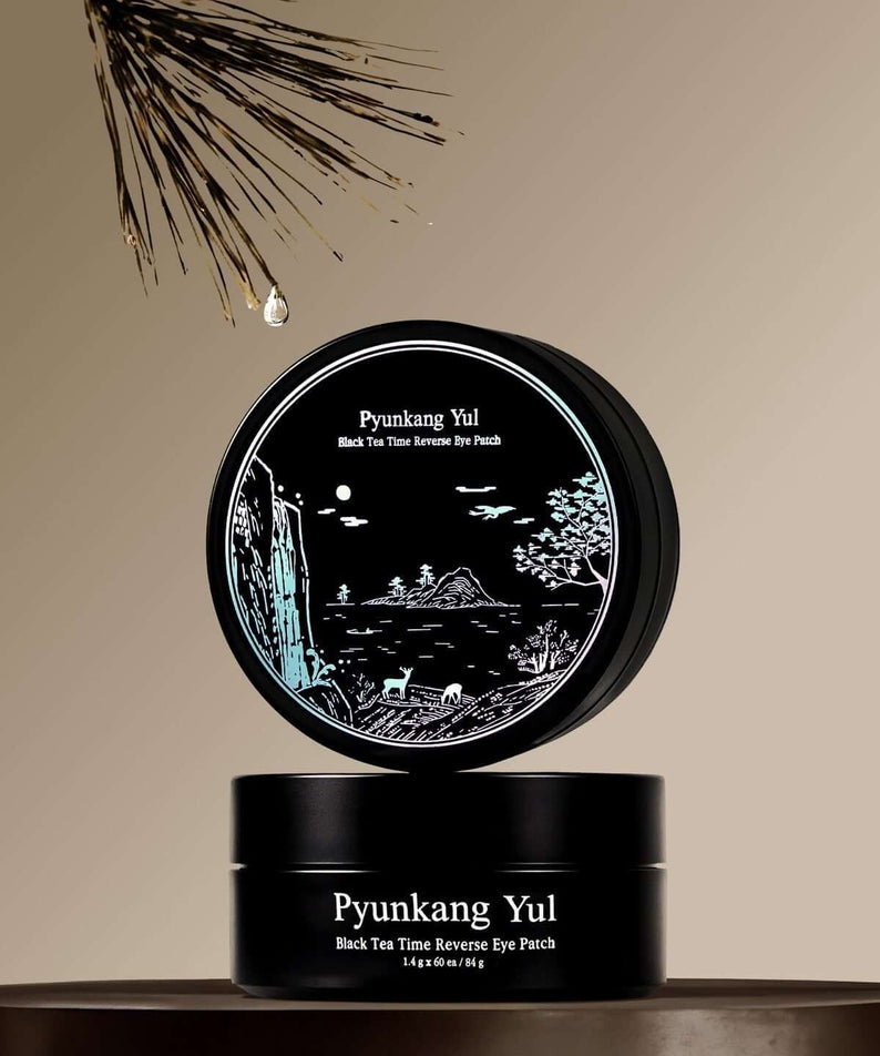 PYUNKANG YUL Black Tea Time Reverse Eye Patch 60 Sheets in elegant packaging on a pedestal