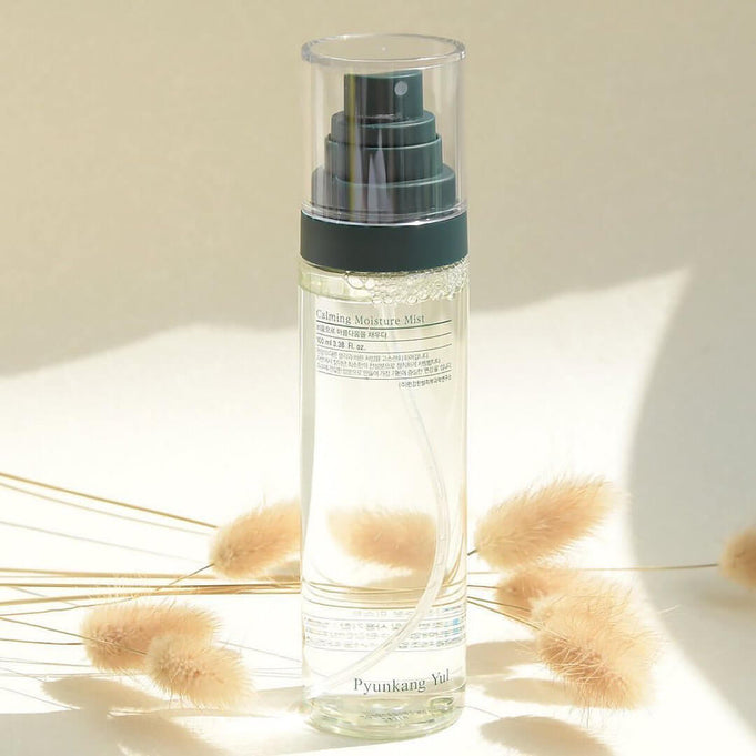 PYUNKANG YUL Calming Moisture Mist 100ml bottle with elegant packaging and natural backdrop
