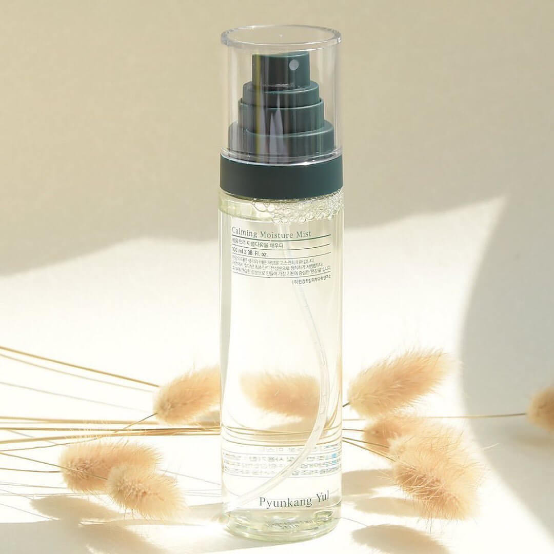 PYUNKANG YUL Calming Moisture Mist 100ml bottle with elegant packaging and natural backdrop