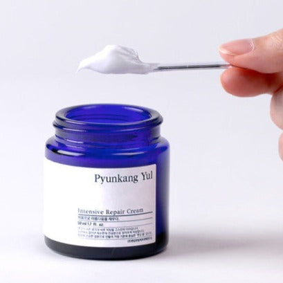 PYUNKANG YUL Intensive Repair Cream 50ml in blue jar with cream on spatula