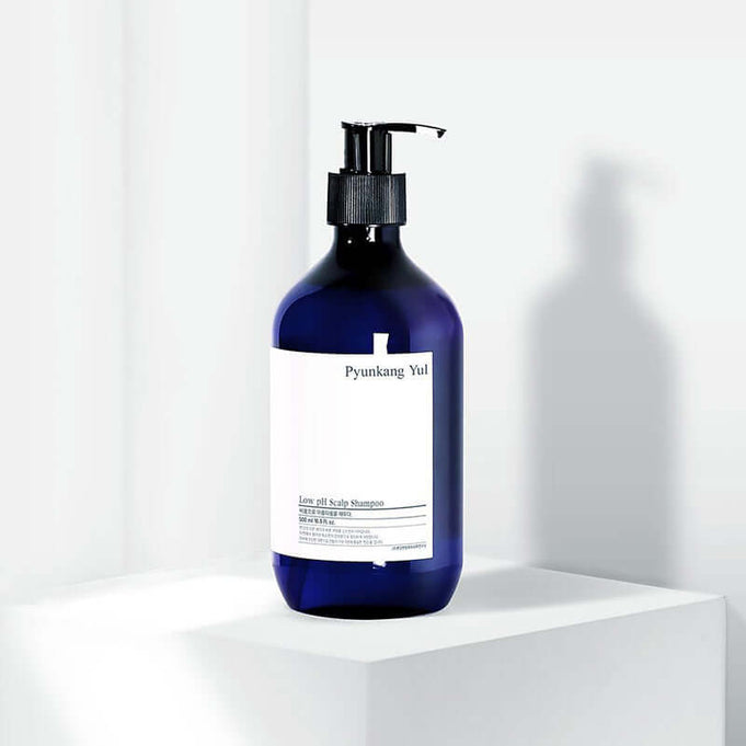 PYUNKANG YUL Low pH Scalp Shampoo 500ml bottle on display, blue packaging with pump dispenser