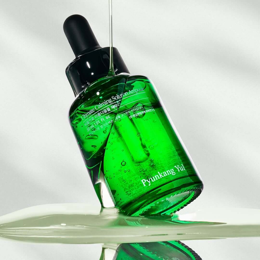 PYUNKANG YUL Ultimate Soothing Solution Ampoule 30ml in vibrant green bottle with dropper, skin care product.