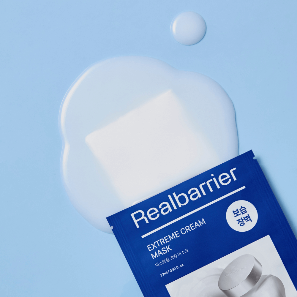 REAL BARRIER Extreme Cream Mask 10 Sheets on blue background with spilled cream