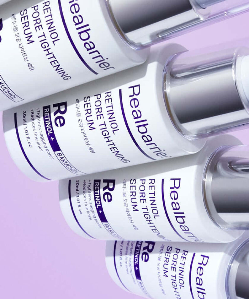 REAL BARRIER Retinol Pore Tightening Serum 30ml skincare bottles on purple background