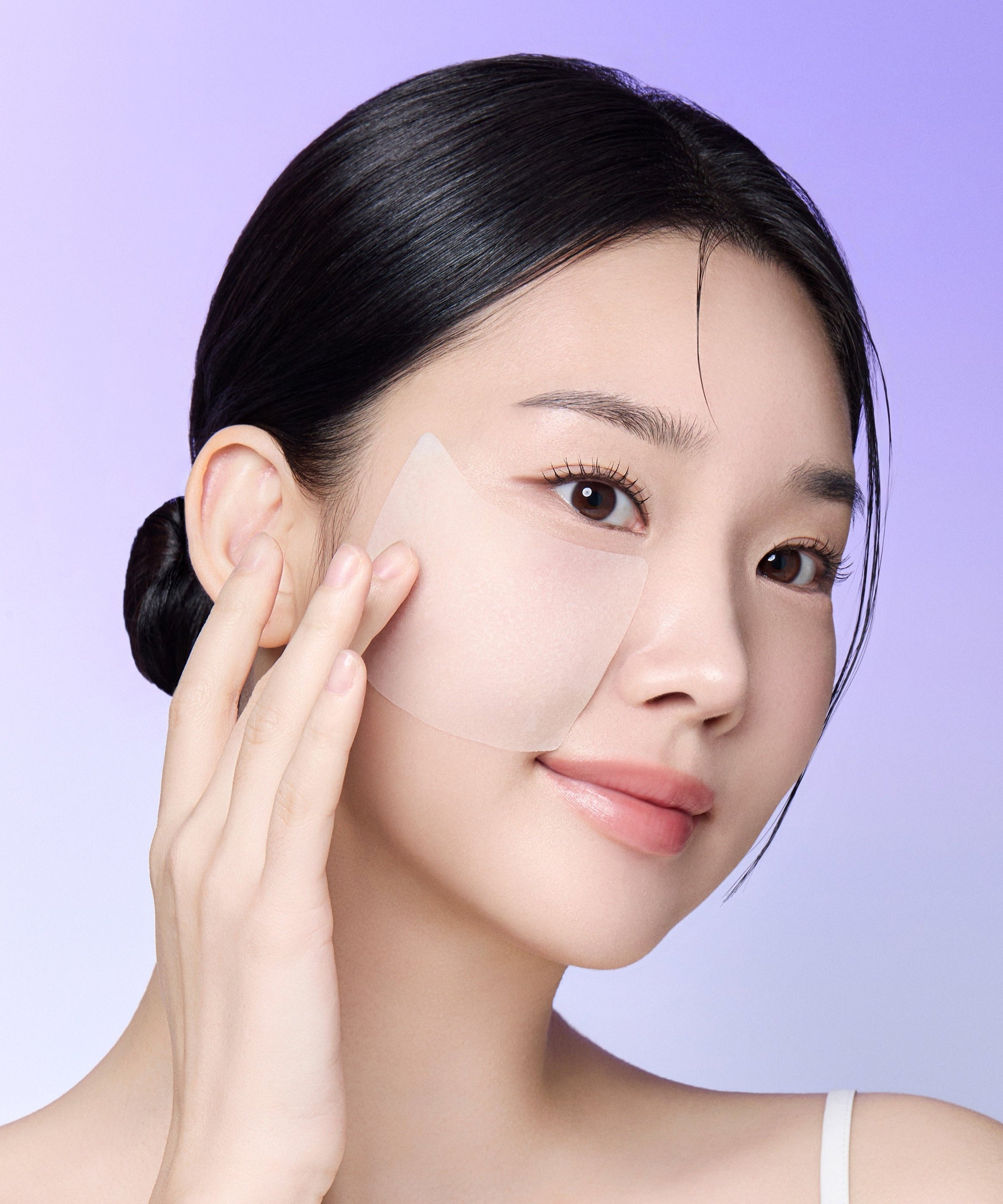 Woman applying REJURAN Derma Healer Pore Tightening Toner Pads 220ml 60 sheets on her face for skincare routine.