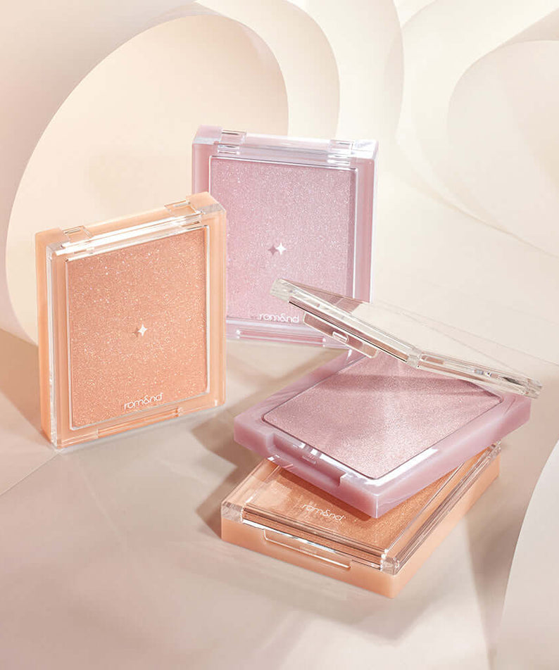 ROMAND see-through veil lighter showcased in elegant packaging with soft pastel colors.