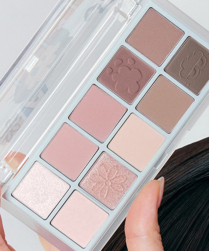 ROMAND x Joanne Friends Better Than Palette featuring diverse matte and shimmer eyeshadow shades in a sleek case.