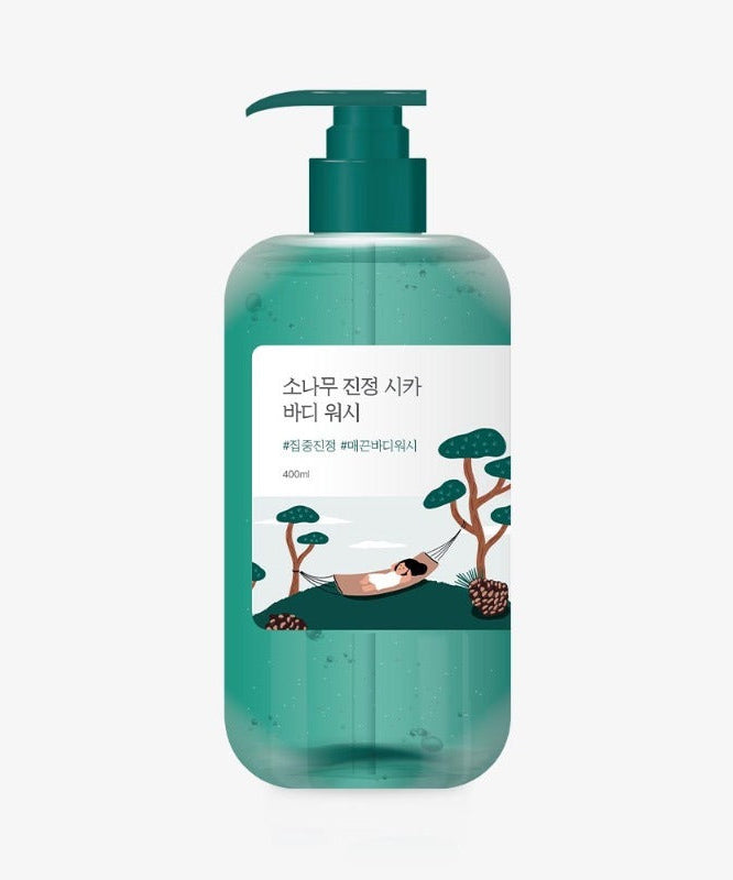 Image of ROUND LAB Pine Calming Cica Body Wash 400ml in a green bottle with a relaxing design.