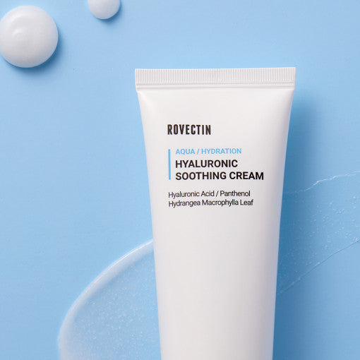 ROVECTIN Aqua Hyaluronic Soothing Cream 60ml on a blue background with cream texture.