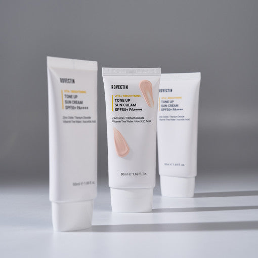 Three tubes of ROVECTIN Vita Tone-Up Sun Cream 50ml with SPF protection, featuring vitamin-enriched formula.