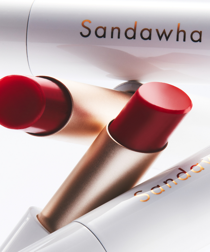 Close-up of SANDAWHA Floral Halo Lip Glow packaging and lipstick shades.