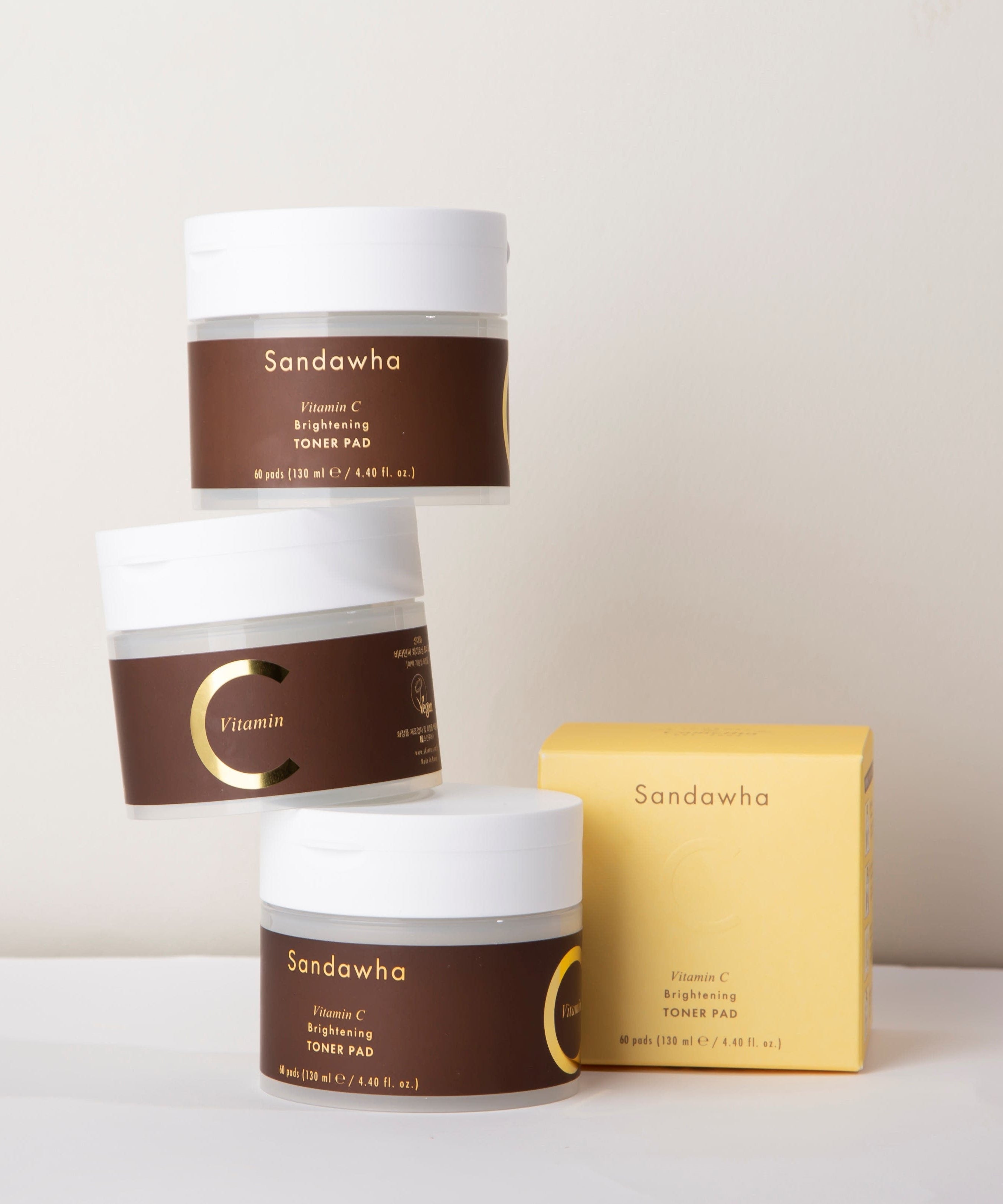 SANDAWHA Vitamin C Whitening Toner pad 60 Sheets displayed with packaging.