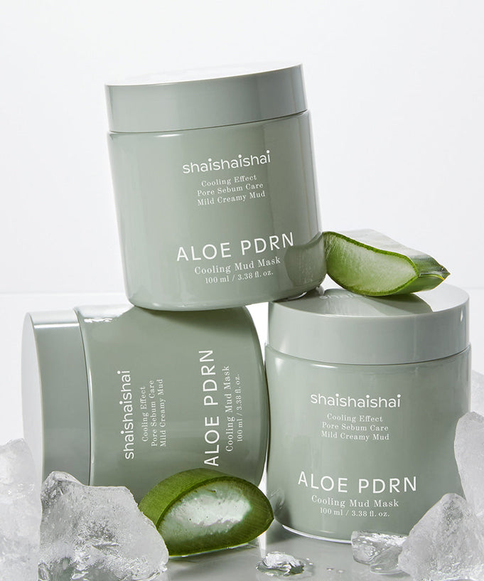 SHAISHAISHAI [1+1]Aloe PDRN Cooling Mud Mask 100ml jars surrounded by aloe vera and ice, showcasing the cooling and soothing effect