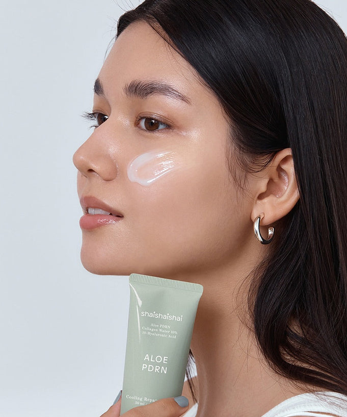 Woman applying SHAISHAISHAI [1+] Aloe PDRN Cooling Repair Cream 50ml on face