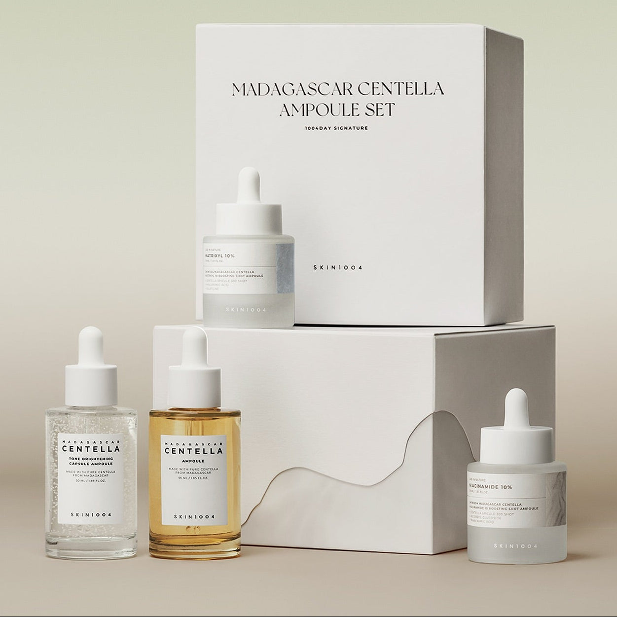 SKIN1004 Madagascar Centella Ampoule Set - 1004 Day Signature with skincare bottles and packaging