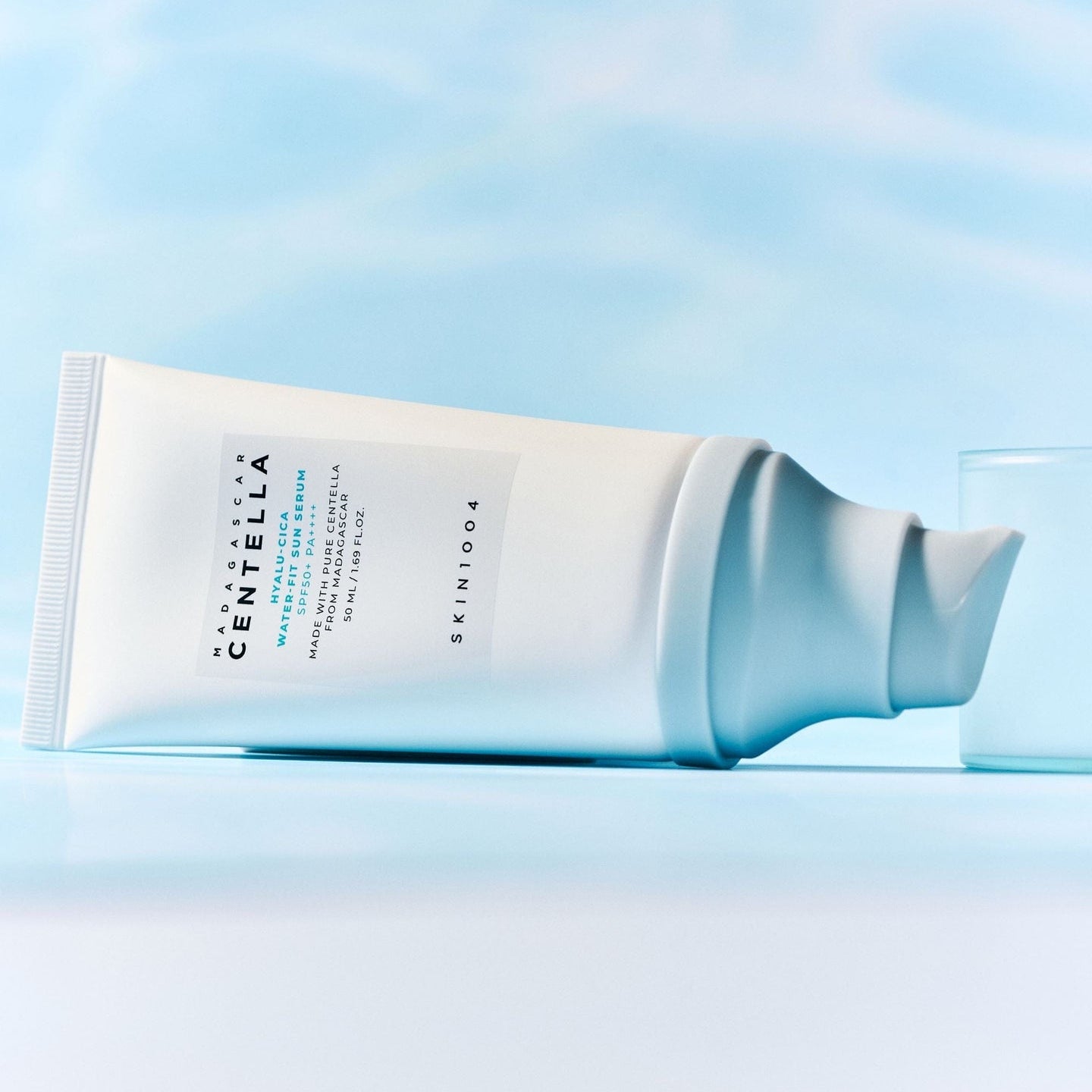 SKIN1004 Madagascar Centella Hyaluronic Acid Water-Fit Sun Serum 50ml product image on blue background