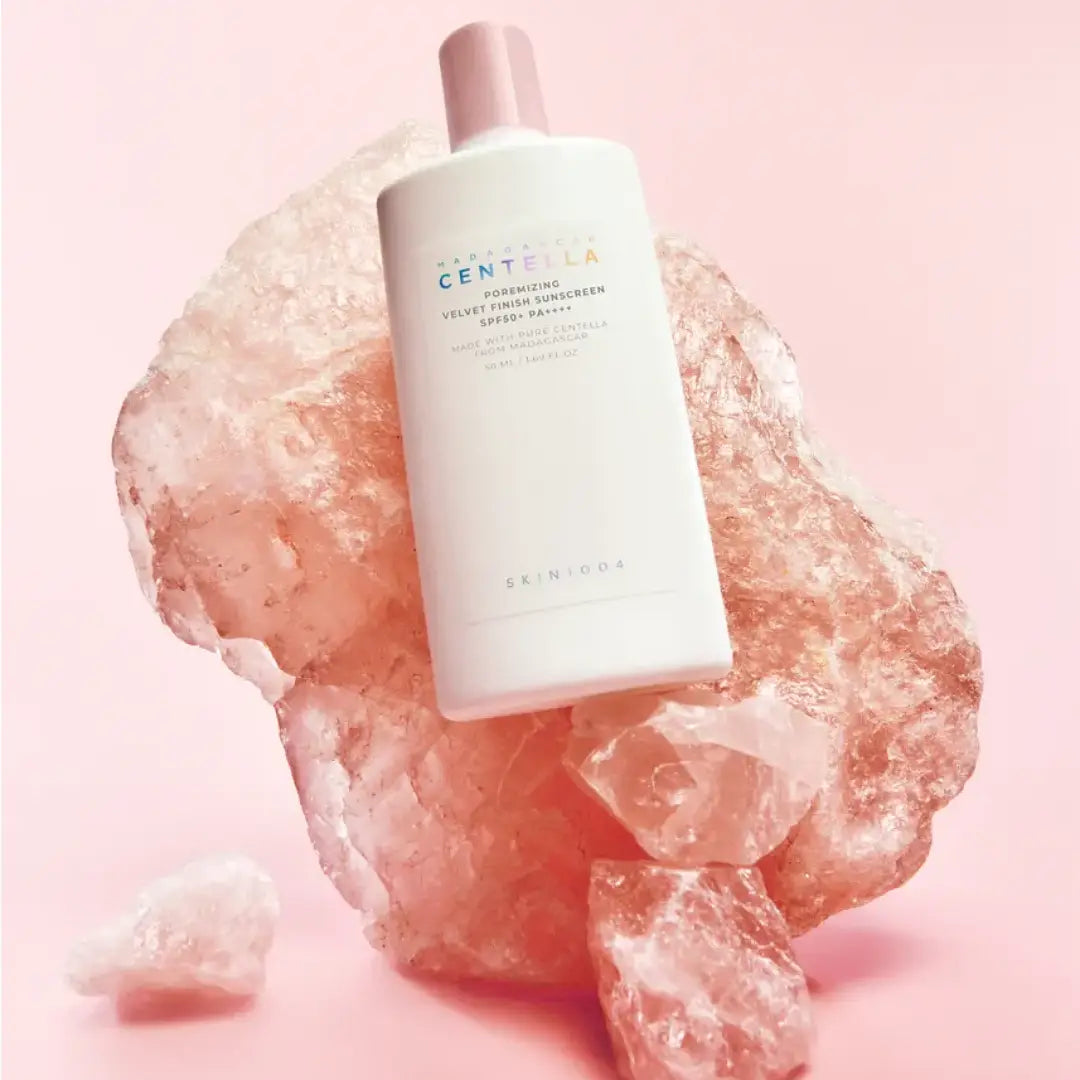 SKIN1004 Madagascar Centella Poreizing Velvet Finish Sunscreen 50ml on pink rock background