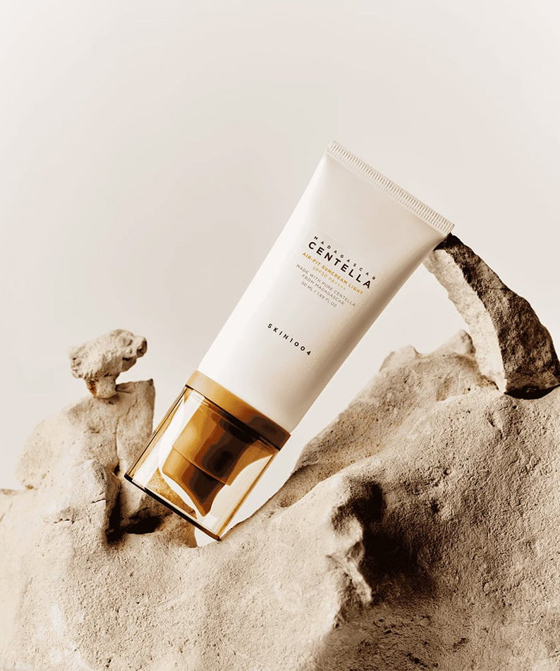 SKIN1004 Madagascar Centella Air-fit Sunscreen Light 50ml on natural rock background