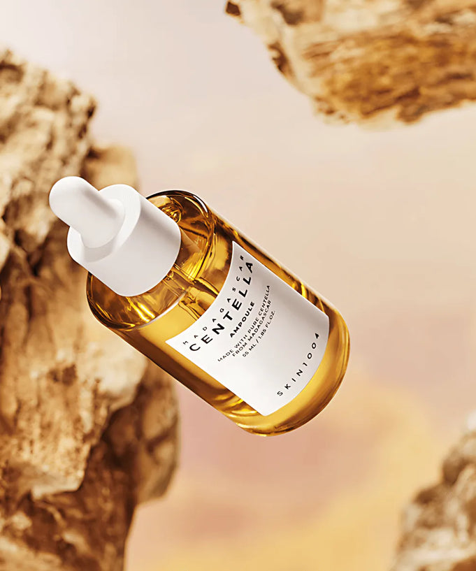 SKIN1004 Madagascar Centella Ampoule 55ml bottle amid natural rocky backdrop