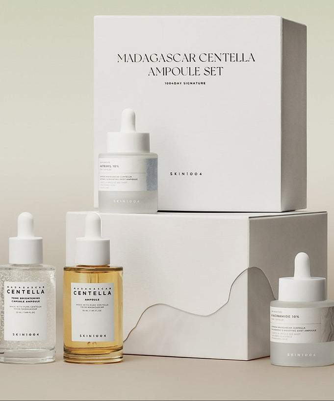 SKIN1004 Madagascar Centella Ampoule Set - 1004 Day Signature with skincare bottles and packaging
