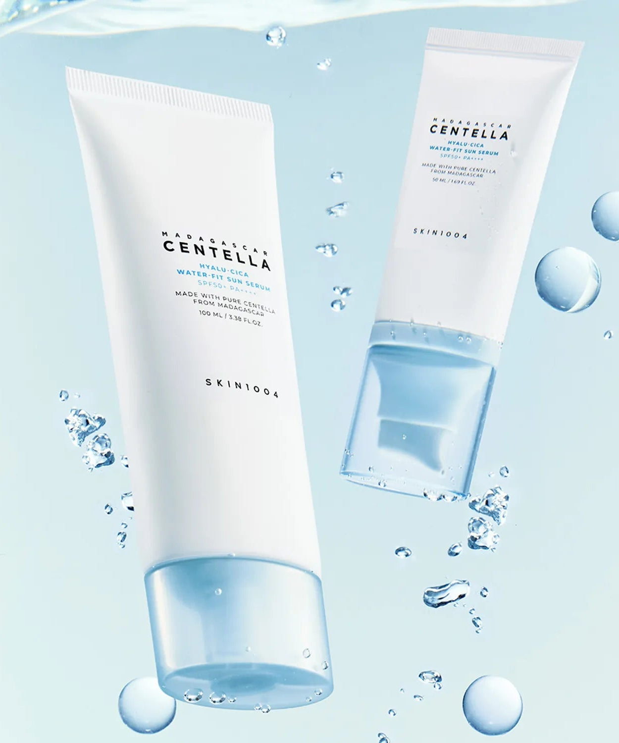 SKIN1004 Madagascar Centella Hyaluronic Acid Water-Fit Sun Serum 100ml with hydrating droplets and light blue background
