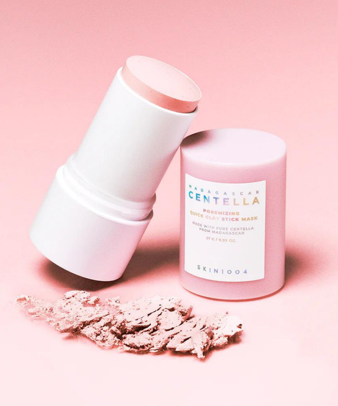 SKIN1004 Madagascar Centella Poremising Quick Clay Stick Mask 27g displayed on pink background